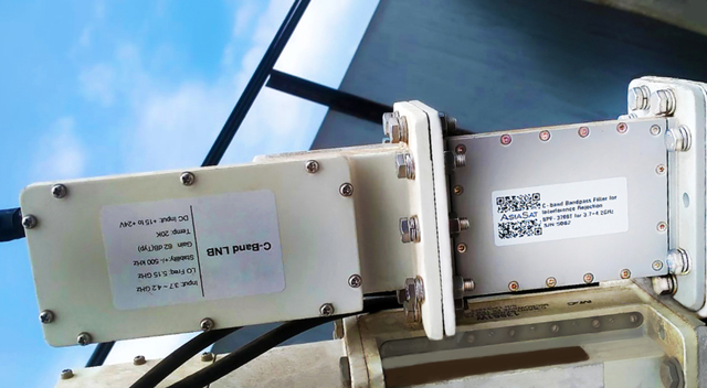 AsiaSat's BPF-3700T bandpass filter connected with the LNB and cabling for the 3.7m satellite antenna